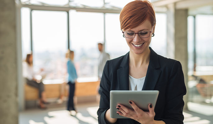 Professional woman working on a tablet device